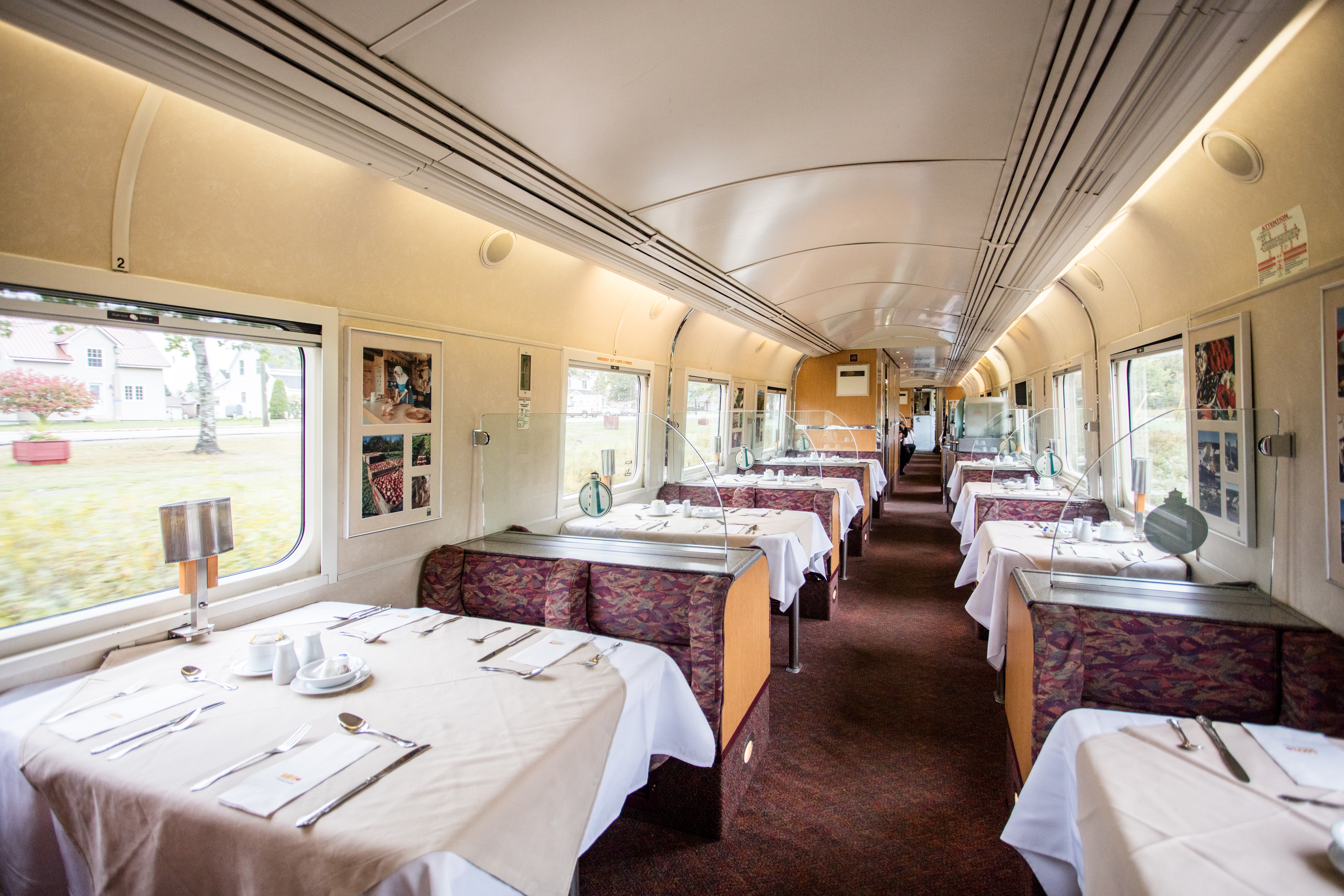 Wide view of inside the dining car on VIA Rail's Ocean train