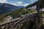 Rocky Mountaineer travelling across Stoney Creek Bridge on the First Passage to the West Route