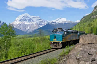 VIA Rail Canadian train passing the Canadian Rockies on its way from Toronto to Vancouver