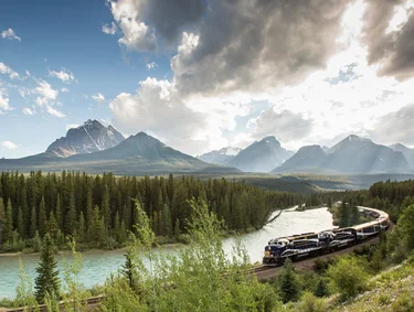 Rocky Mountaineer train going around Morant's Curve in the Canadian Rockies