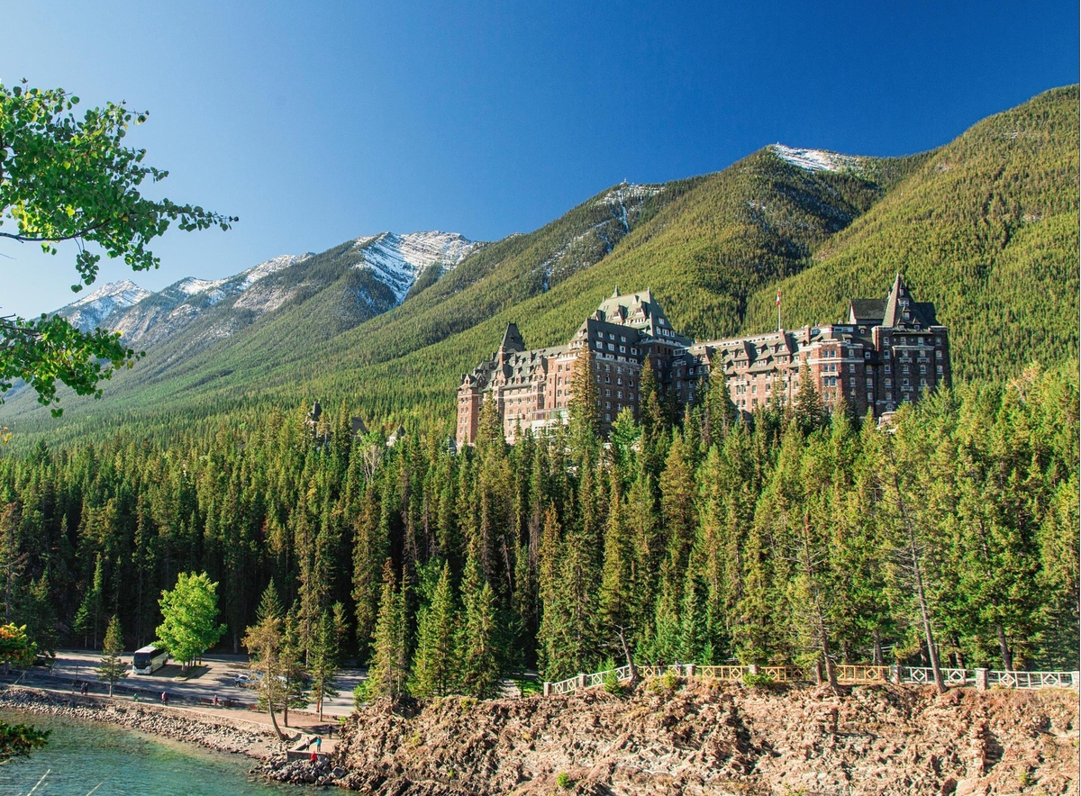 Fairmont Banff Springs with mountains and river