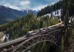 Rocky Mountaineer travelling across Stoney Creek Bridge on the First Passage to the West Route