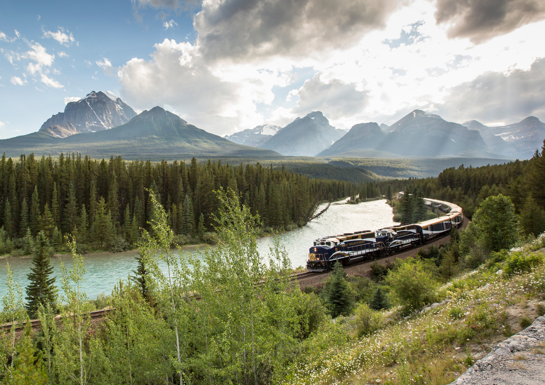 Rocky Mountaineer train going around Morant's Curve in the Canadian Rockies