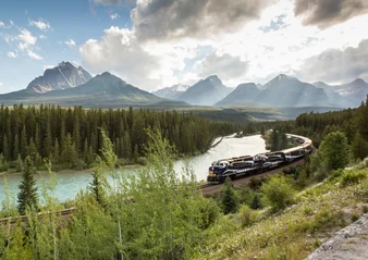 Rocky Mountaineer train going around Morant's Curve in the Canadian Rockies