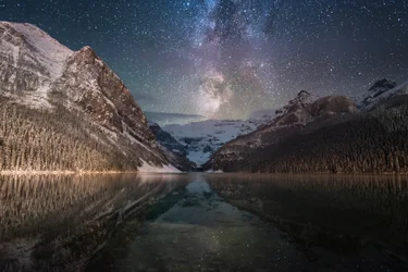 Milky way over the sky in rockies mountain Banff National Park alberta Canada Winter