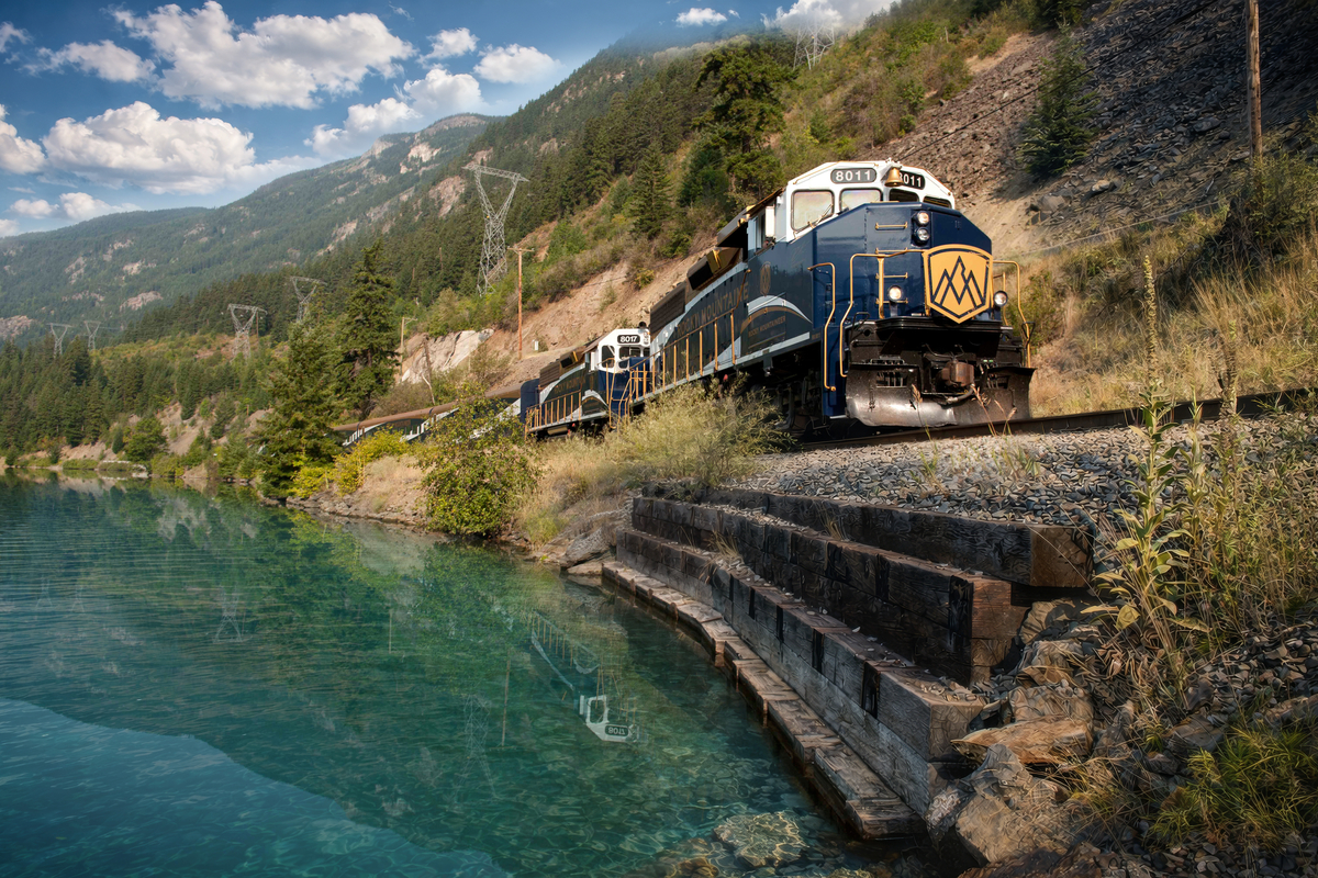 The Rocky Mountaineer train travelling past Gates Lake on the Rainforest to Gold Rush Route
