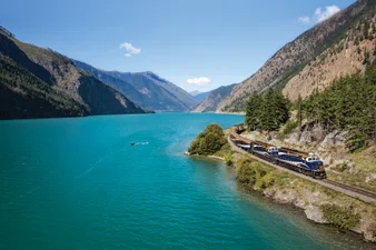 The Rocky Mountaineer train travels past Seton Lake on the Rainforest to Gold Rush route
