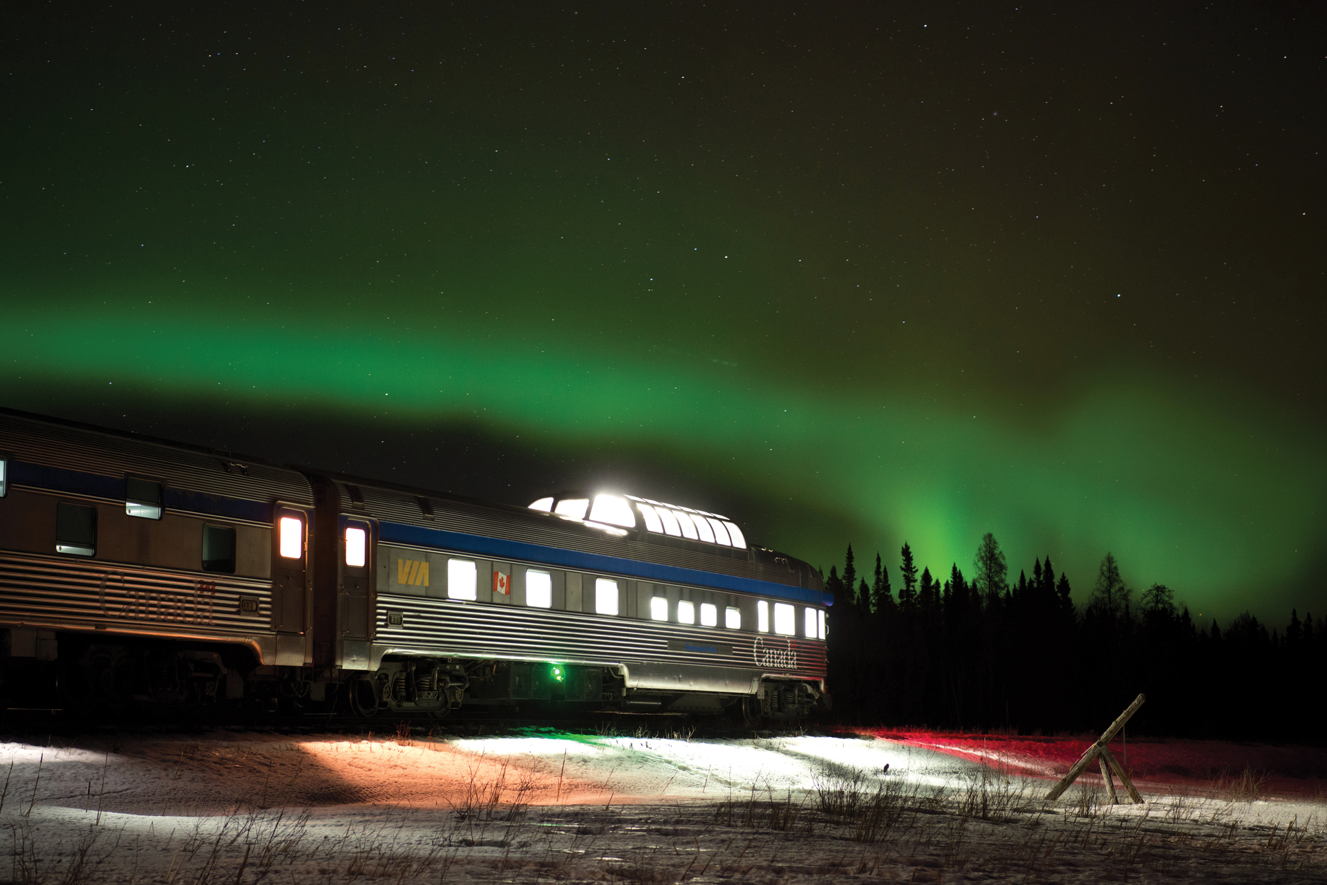 The VIA Rail train to Churchill passes under the northern lights