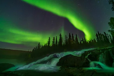 Aurora over the Ramparts Falls on the Cameron River near Yellowknife, Northwest Territories, Canada.