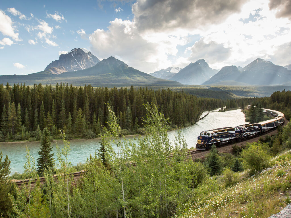 Rocky Mountaineer train going around Morant's Curve in the Canadian Rockies