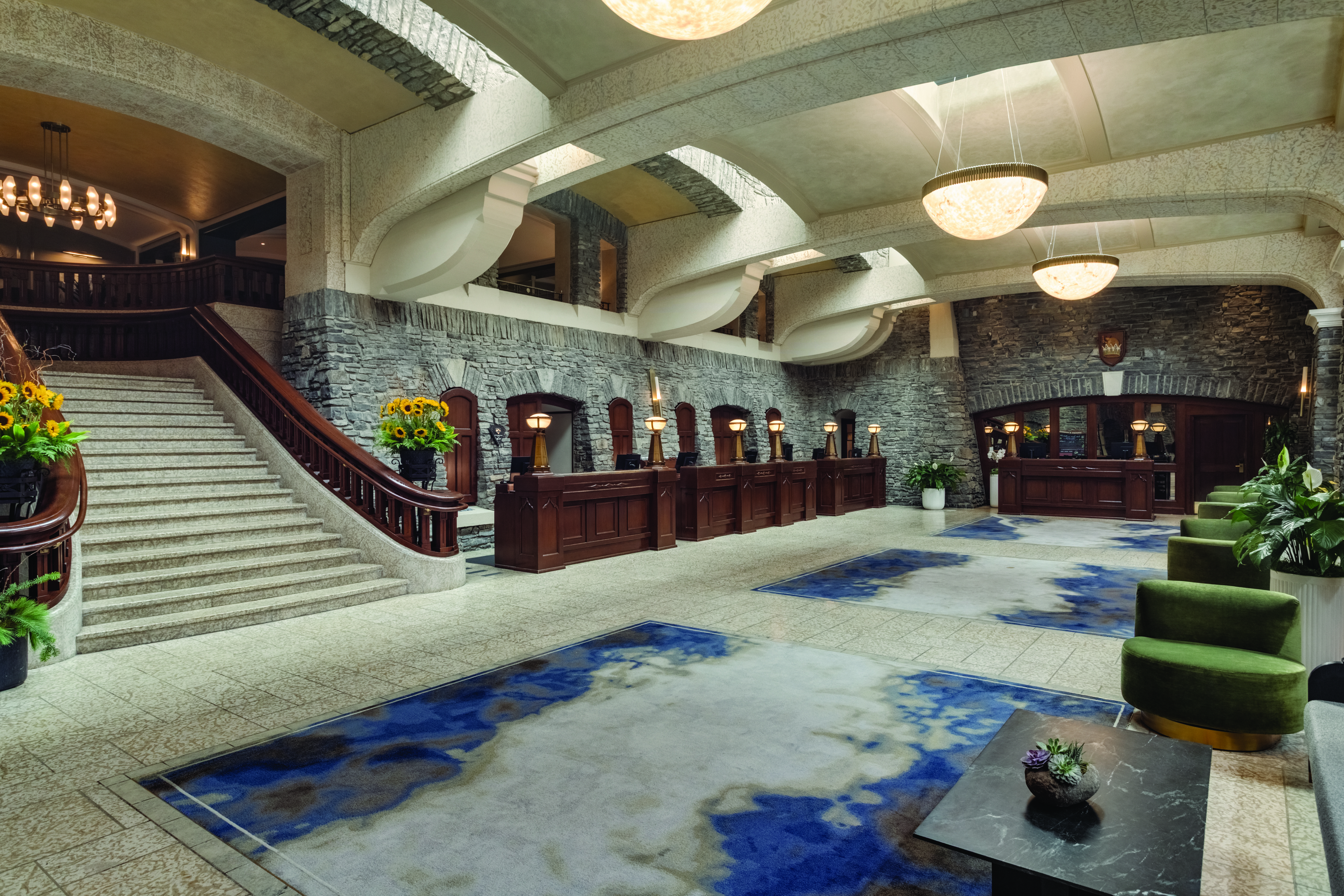 The lobby stairs of the Fairmont Banff Springs in Alberta