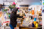 A woman looks at local products in a gift store at The Forks