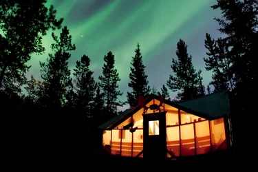 Northern lights over a cabin