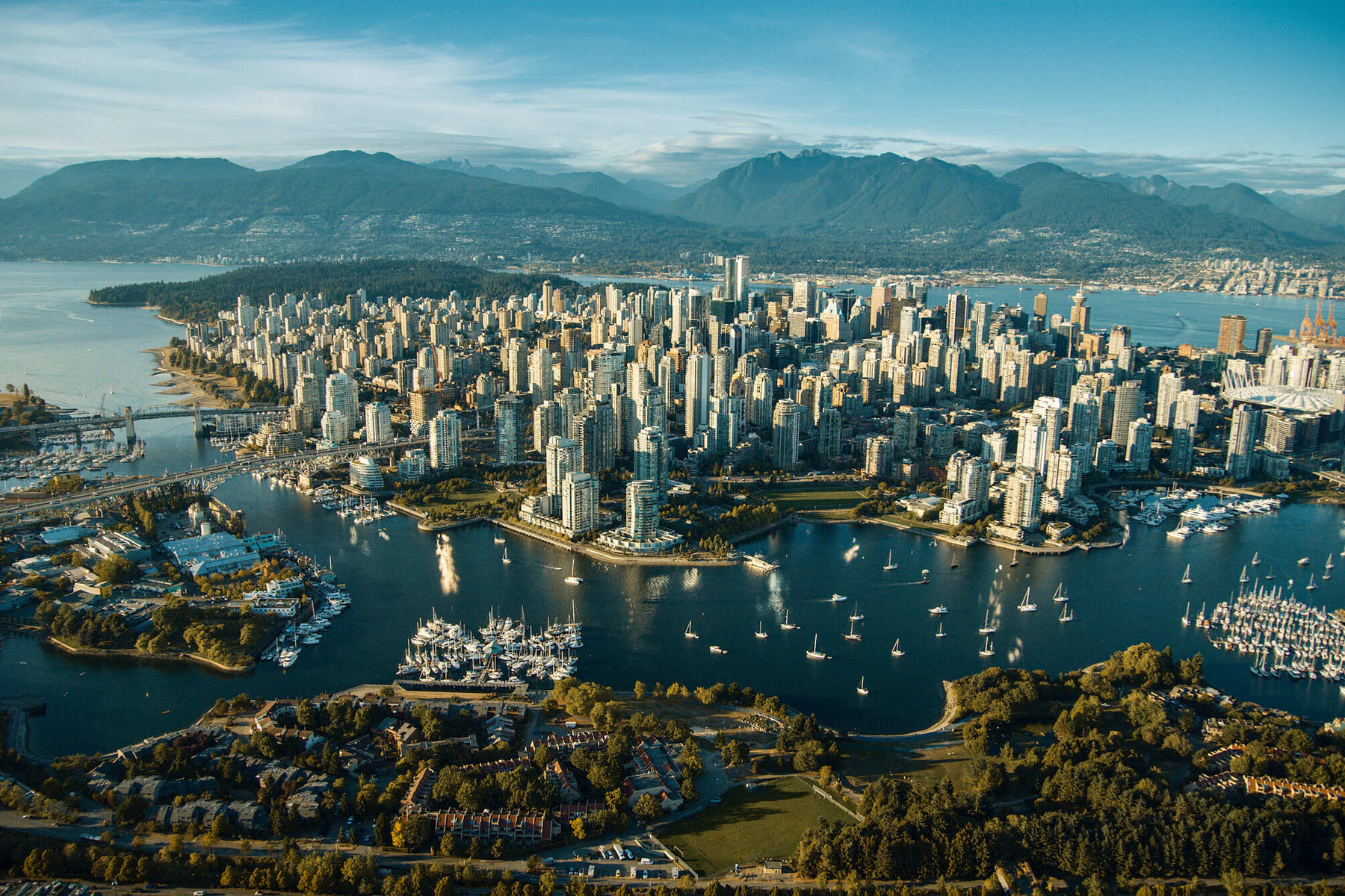 Aerial view of FIFA World Cup host city Vancouver on a clear day, Burrard Inlet and North Shore mountains