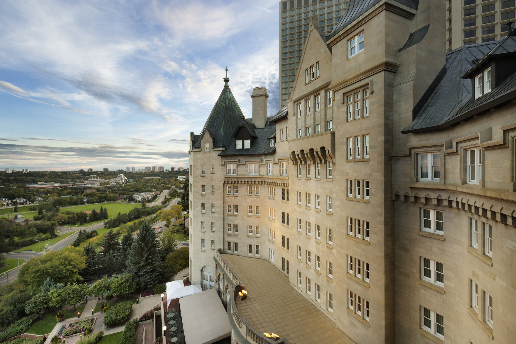Exterior side view of Fairmont Hotel Macdonald on a sunny day in Edmonton, Calgary, Alberta