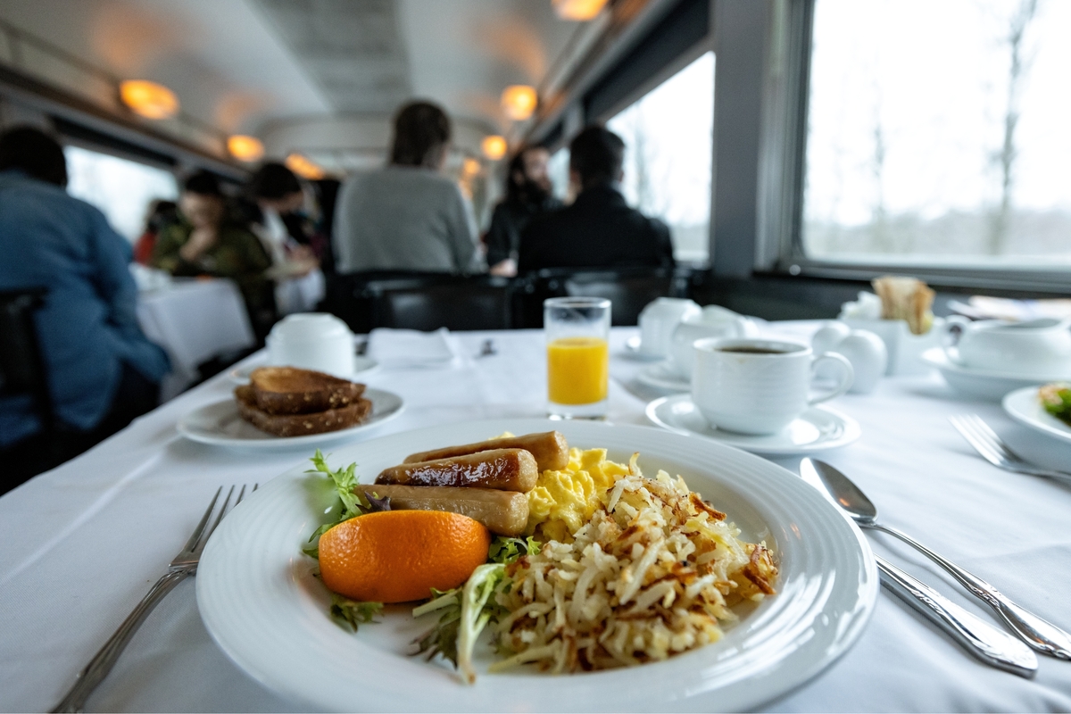 Breakfast in the dining car on VIA Rail's The Canadian train, which travels to Eastern Canada. 