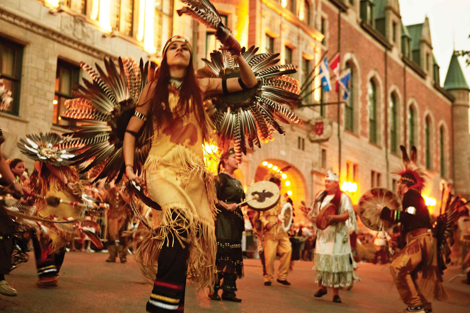A group of indigenous dancers perform as part of the celebrations of the Holidays of New France.