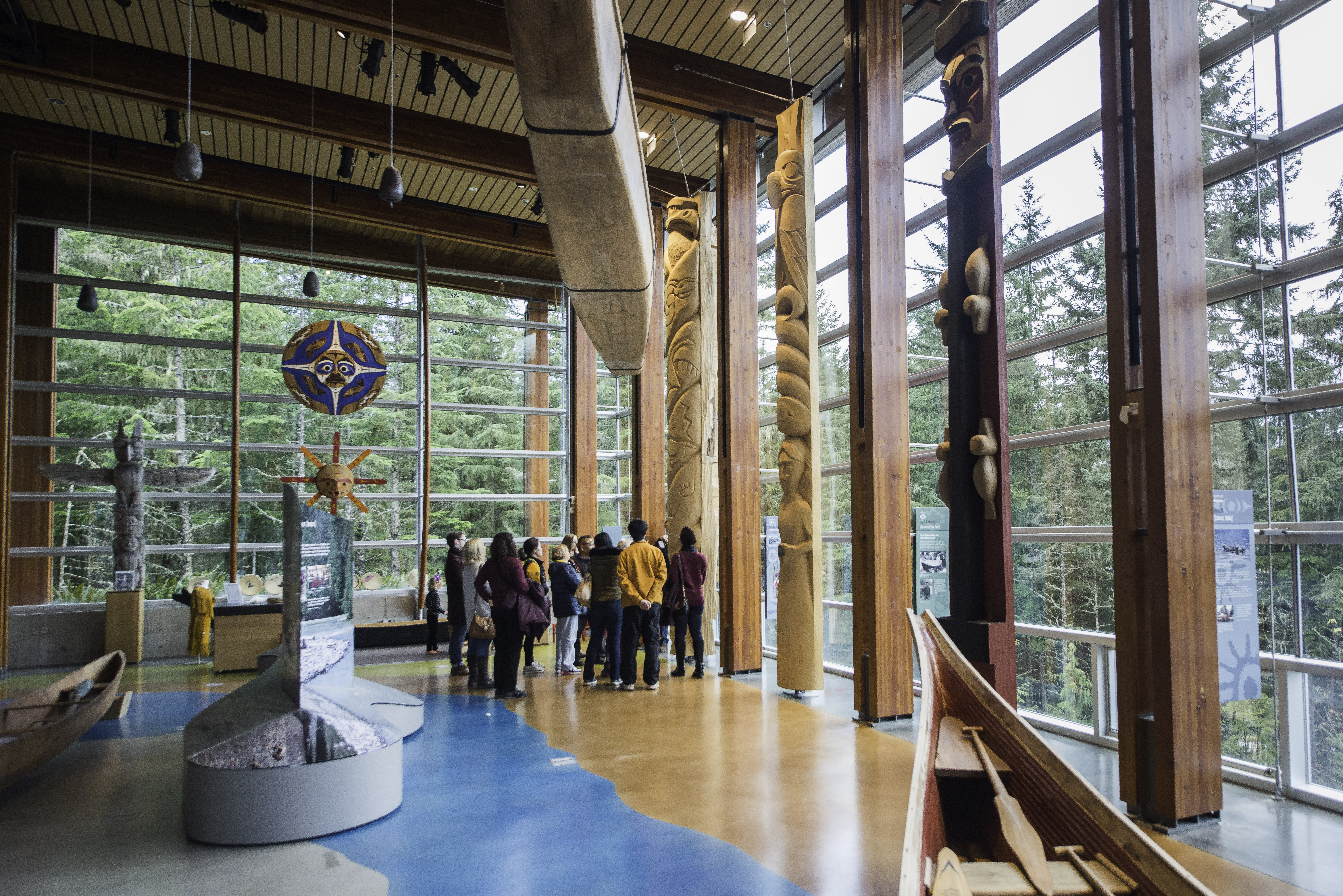 A group of people on a tour at the Squamish Lil'wat Cultural Centre in Whistler
