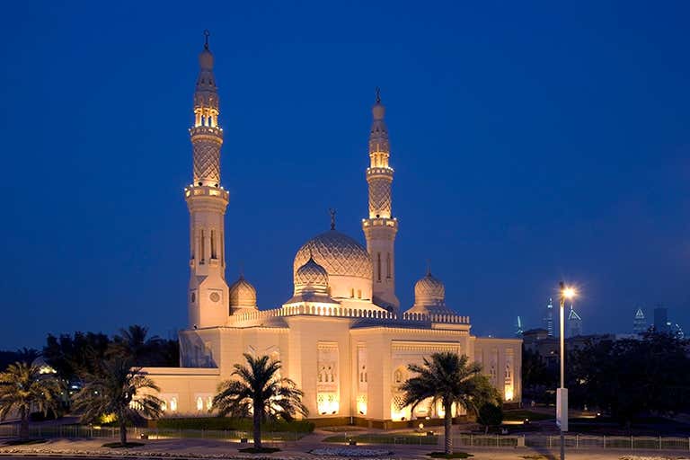 Jumeirah Mosque, a stunning white mosque with intricate Islamic architecture.