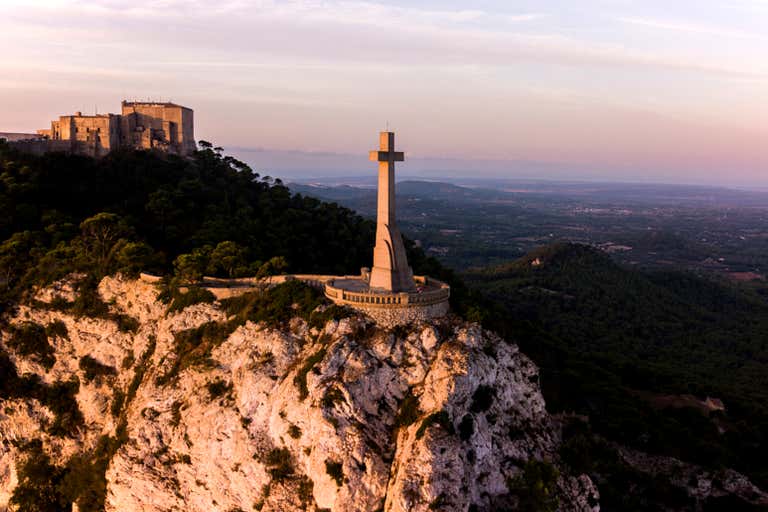 Aerial view of the Sanctuary of Sant Salvador in Mallorca at sunset.
