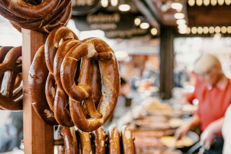 Close-up of pretzels hanging at a market stall in Berlin