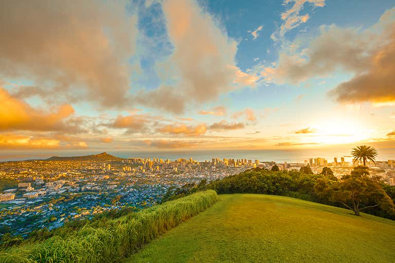 Scenic view of Honolulu and Diamond Head at sunset from Tantalus Lookout.