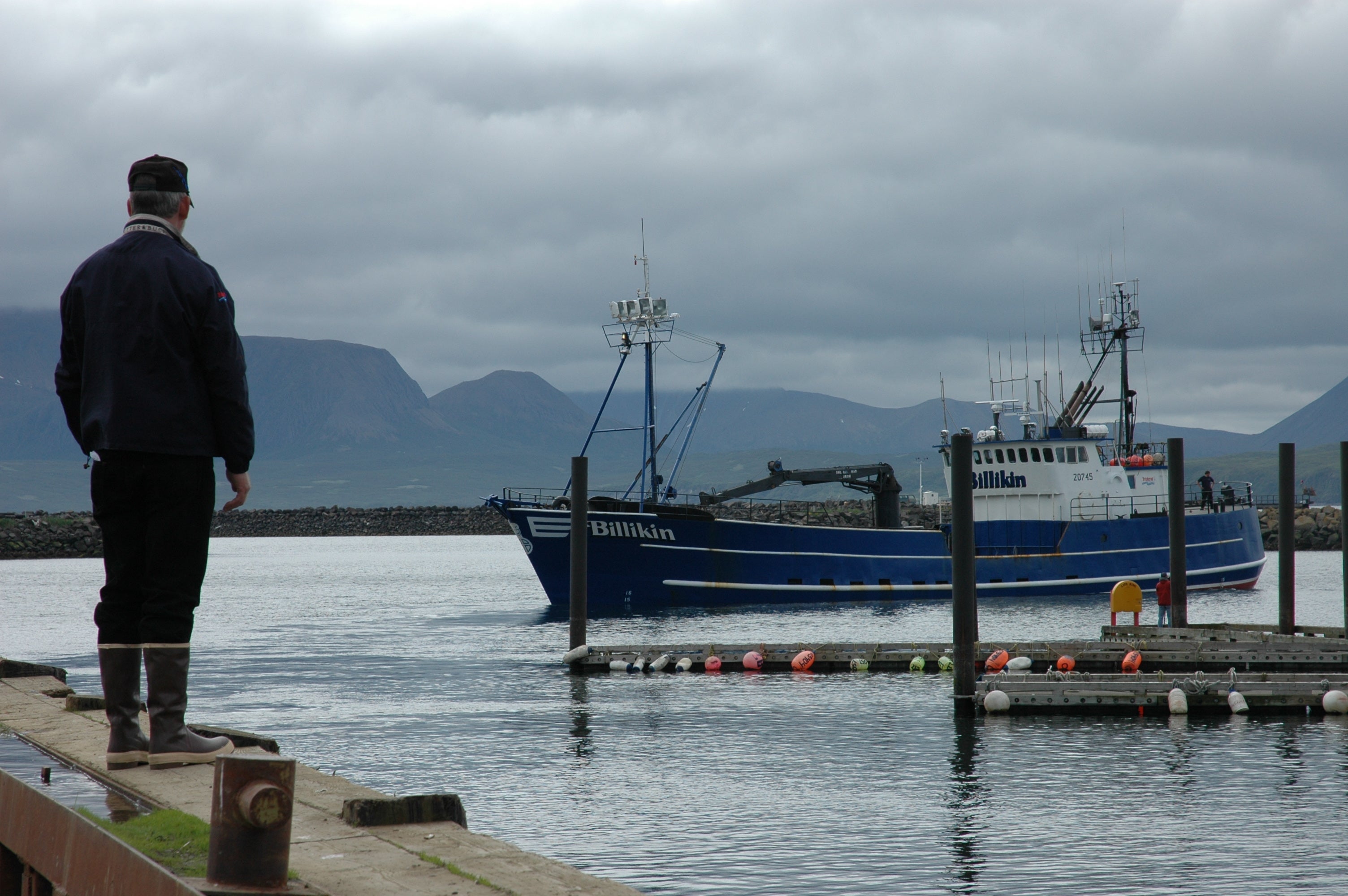 Chuck Bundrant standing on the dock awaiting the arrival of the F/V Billikin