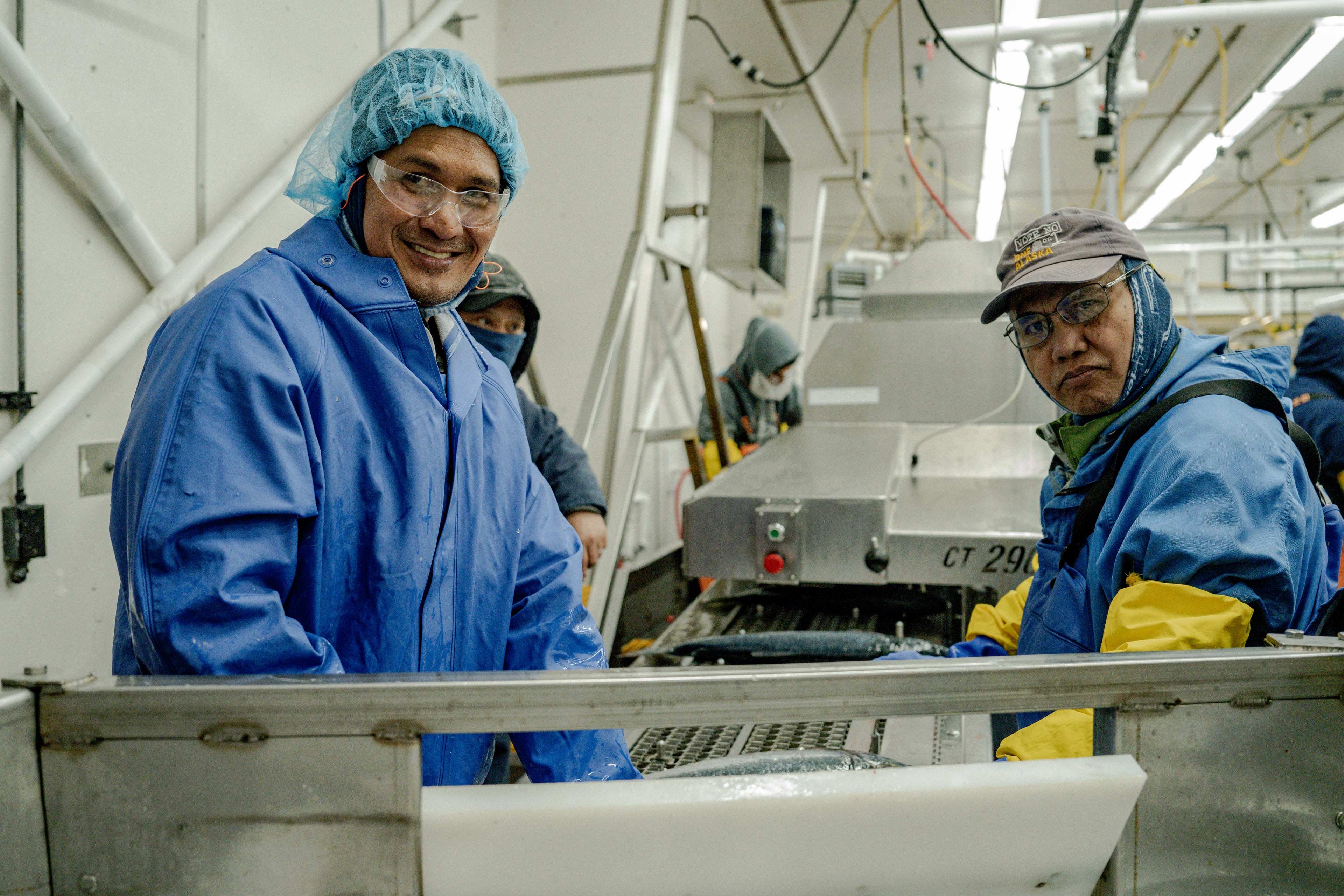 two men working on the factory floor