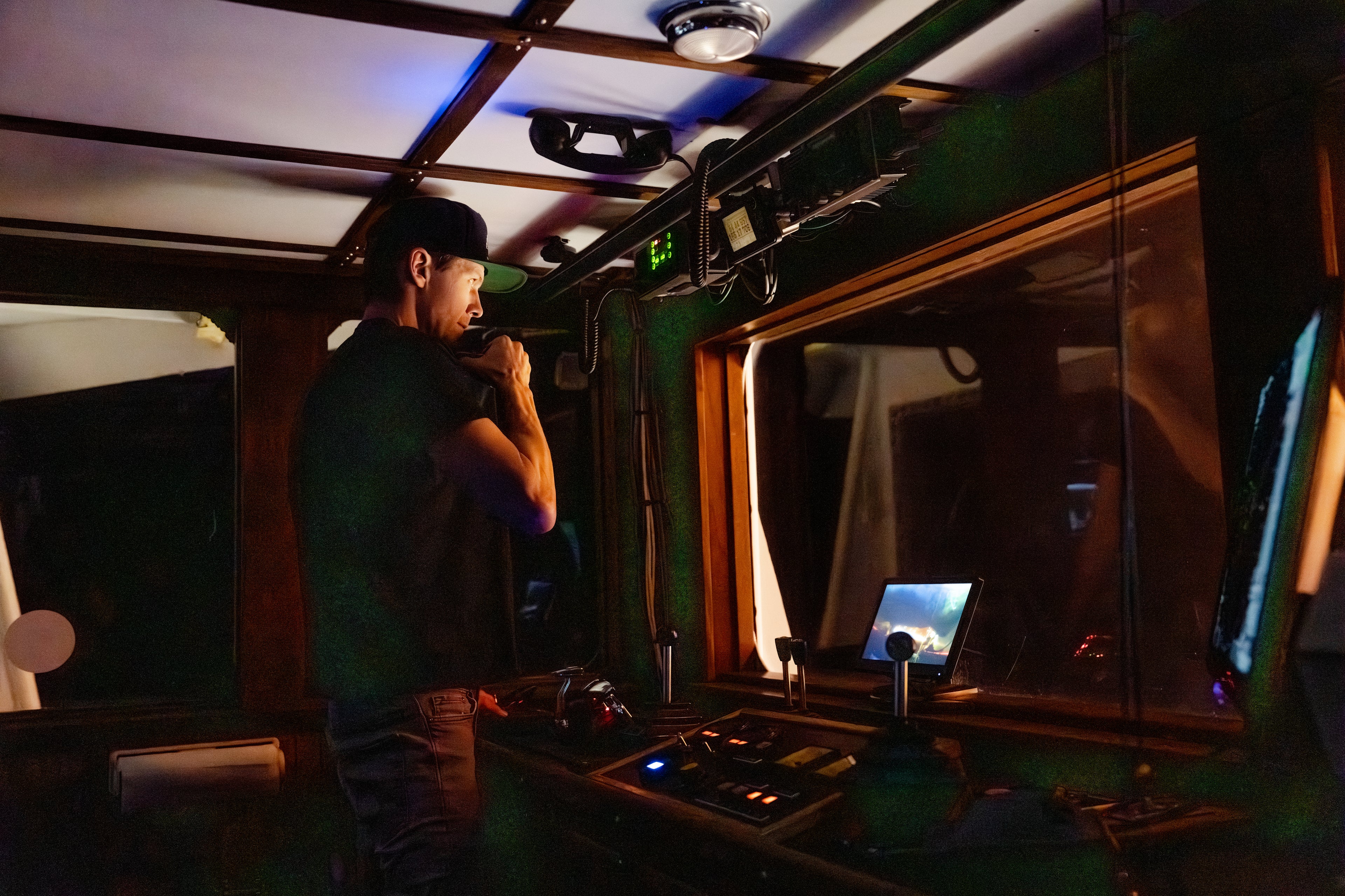 Captain Gus Molan at the helm of F/V Northern Patriot