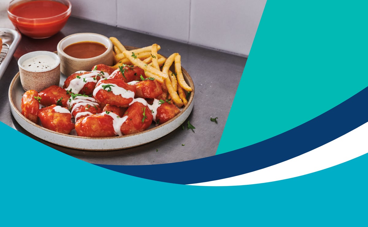 Crispy battered sauceable Wild Alaska Pollock nuggets served with fries and dipping sauces, a finalist in the 2026 Seafood Excellence Awards.