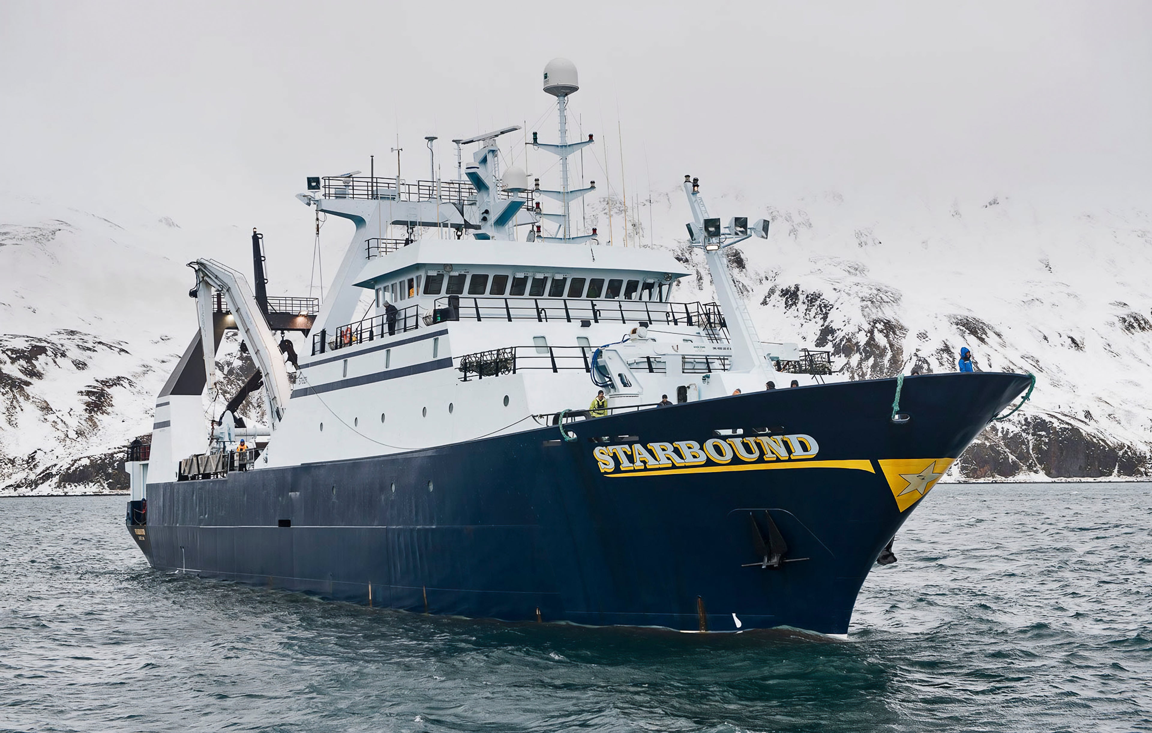 Starbound fishing boat on the ocean