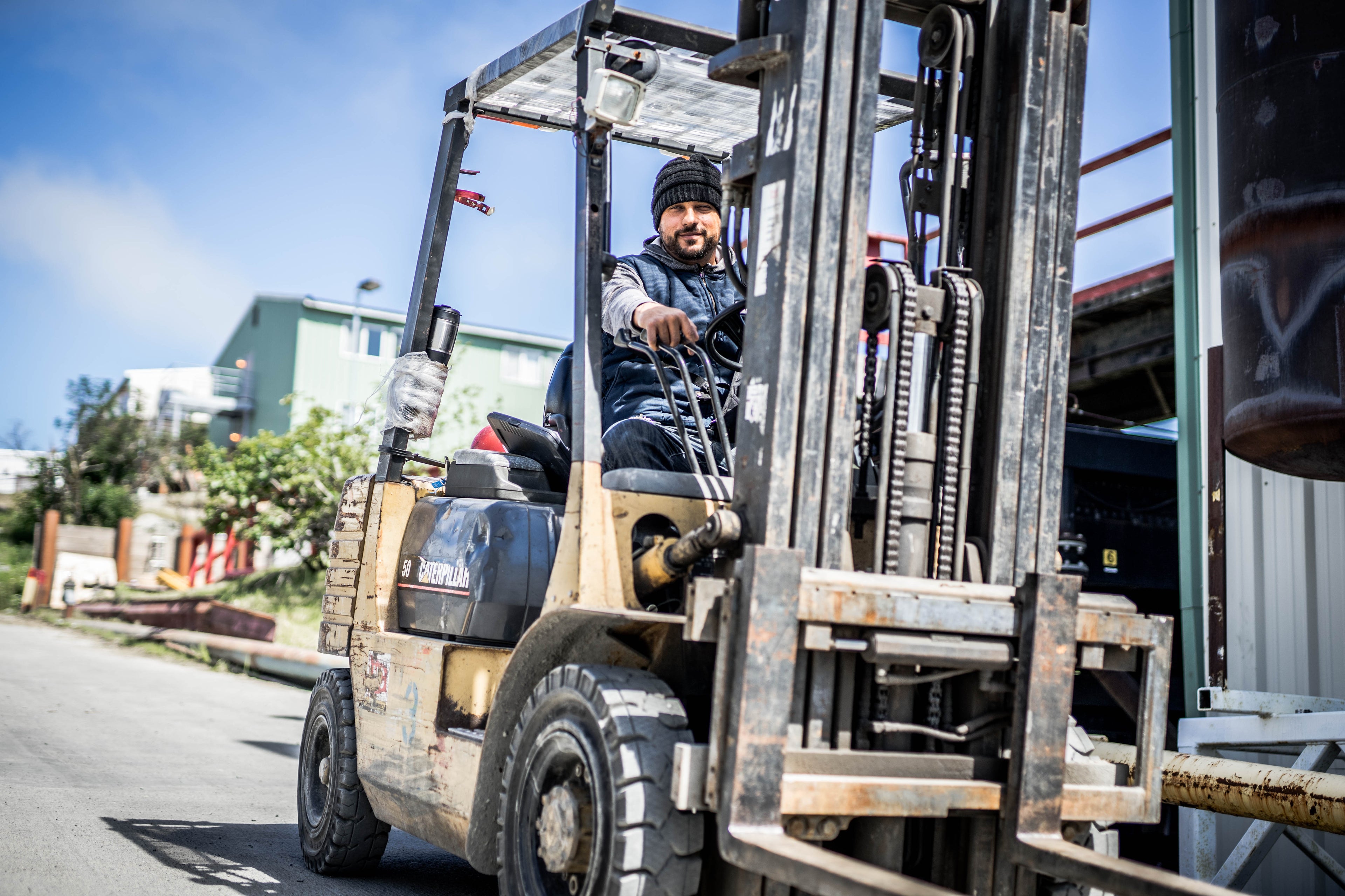 Worker in Alaska on folklift