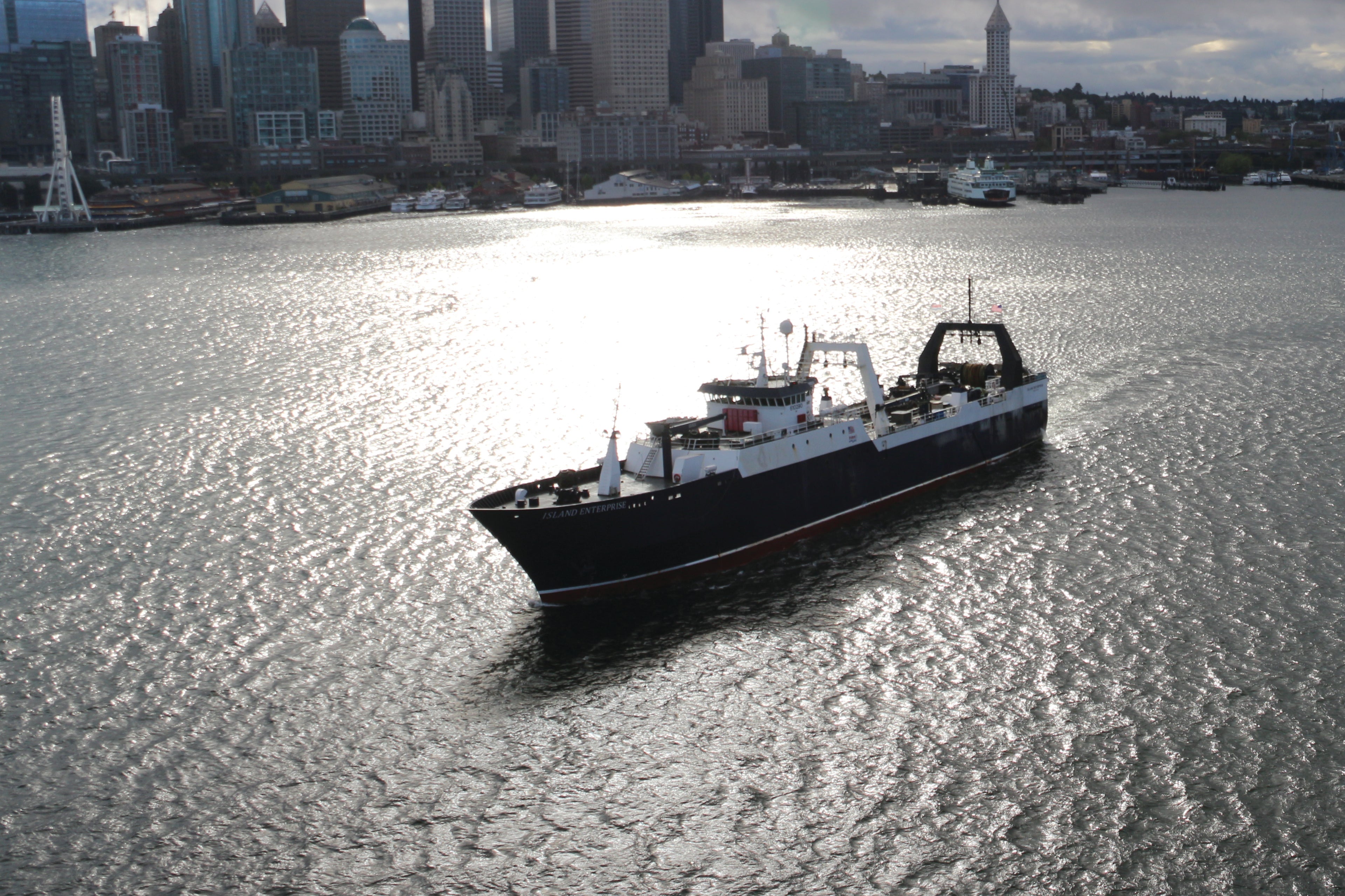 Starbound vessel in front of Seattle waterfront