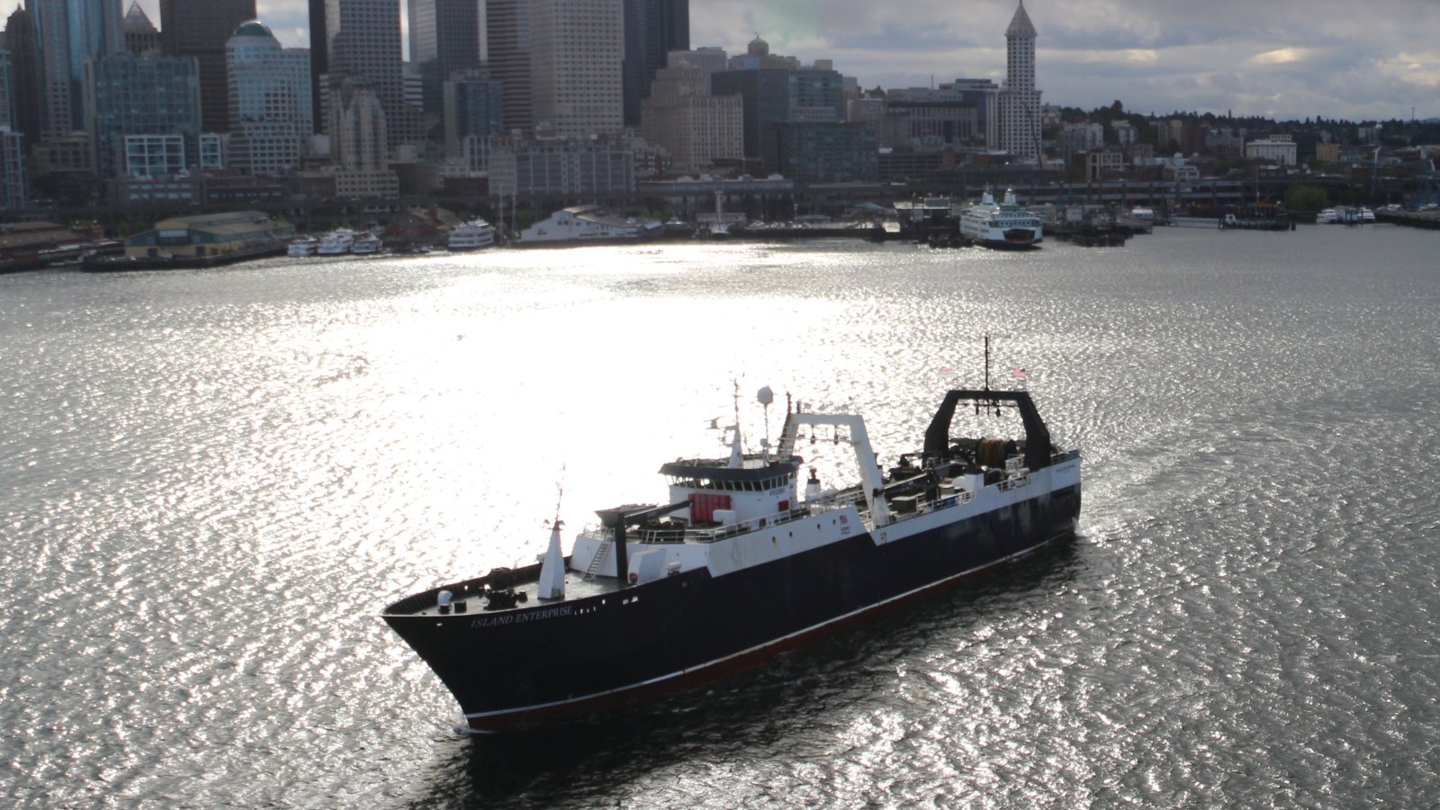 Starbound vessel in front of Seattle waterfront