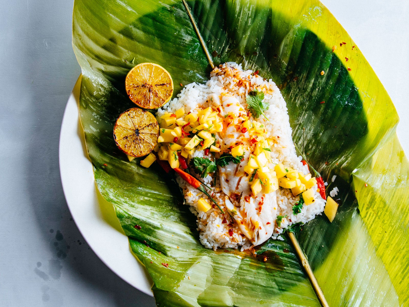 Wild Alaska Pollock Steamed in banana Leaves with Chiles and Mango Salsa