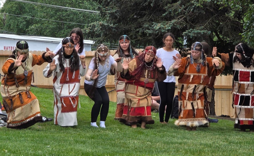 Members of Alaska's Unangax people perform a traditional dance at AIPA's culture camp