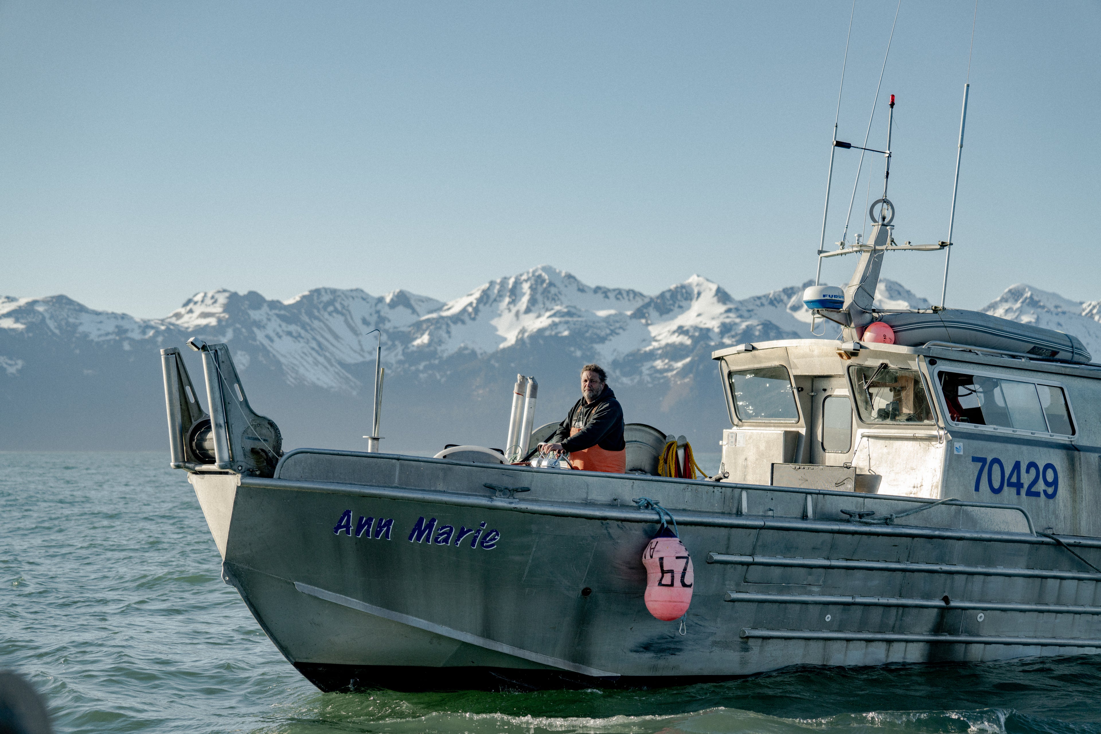 Fishing gillnetter with mountains in the background