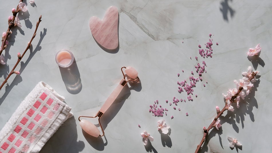 Crystal rose quartz facial roller and Gua sha stone