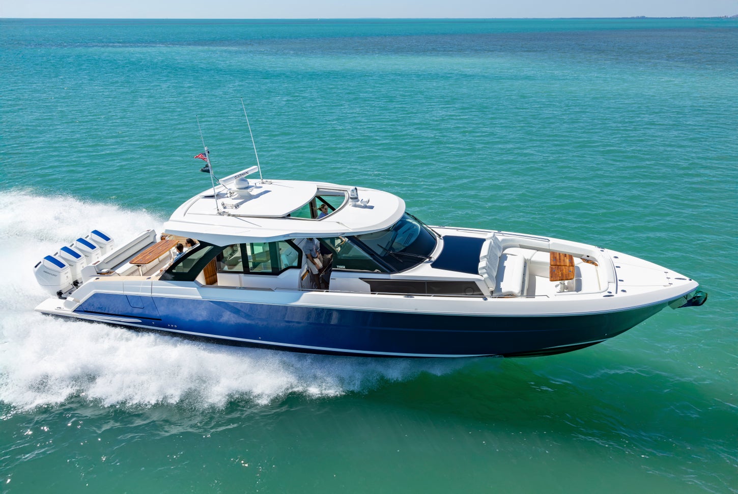 56 LS Running to Starboard - Hull Color: Estoril Blue