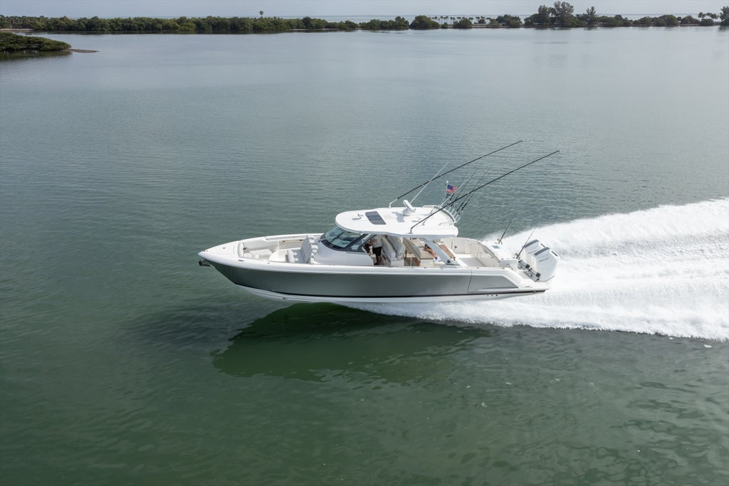 Tiara Yachts 43 LS running to port, Bright Silver hull color, Adventure Module