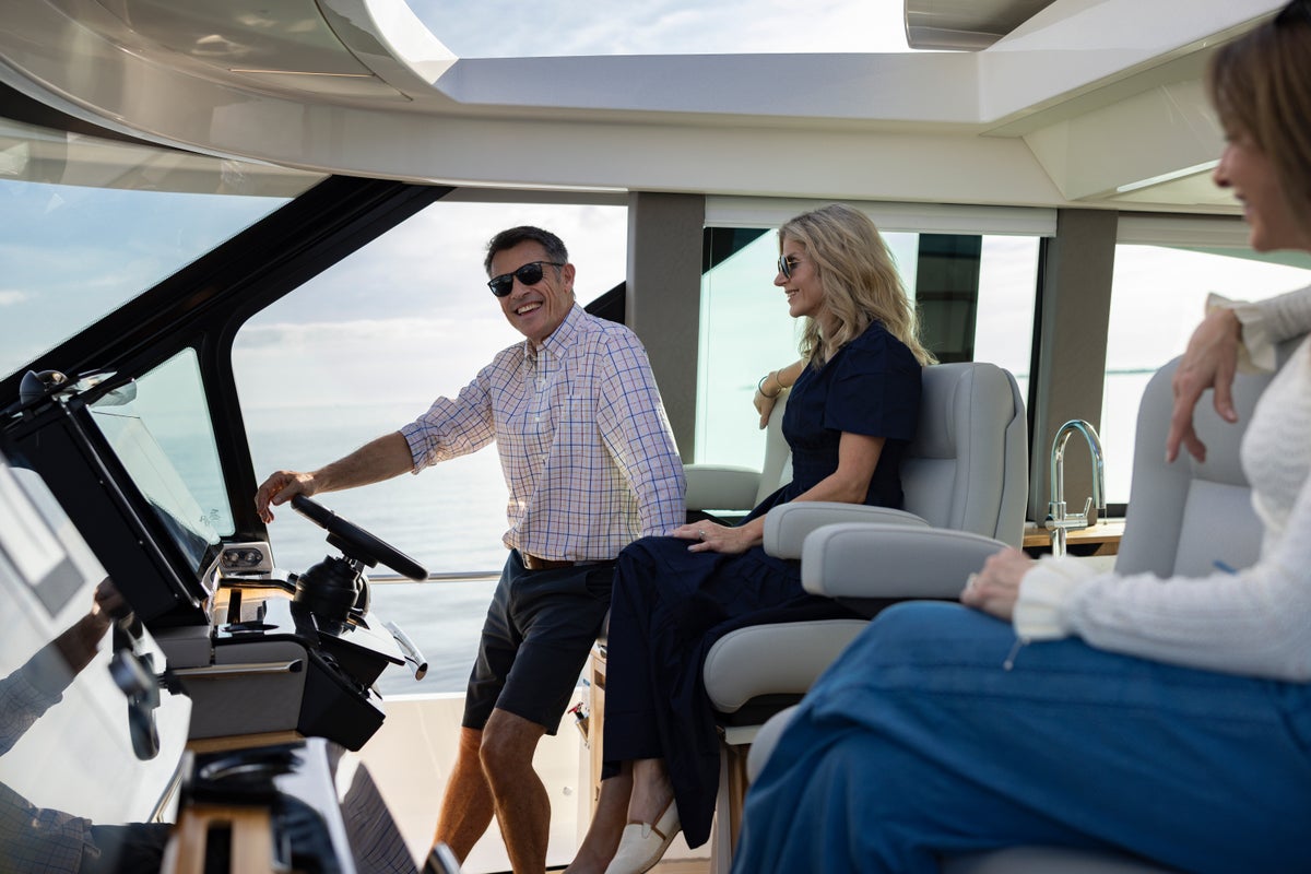 Man and woman at helm of the EX 60