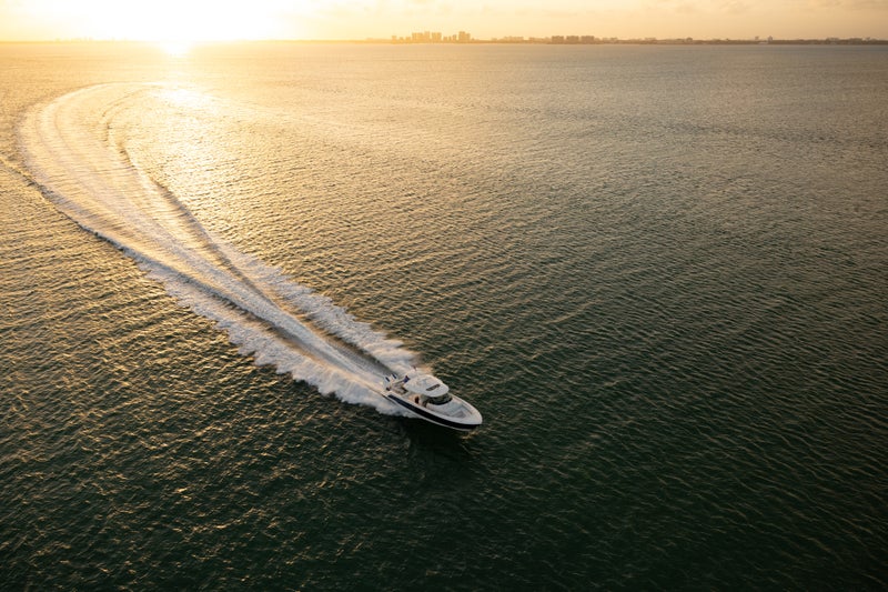 Tiara Yachts 43 LS running at dusk