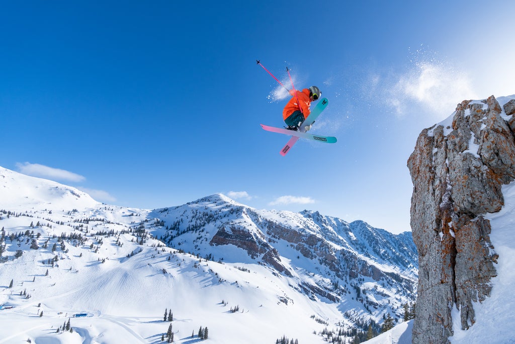 Snowbird_Skier Mute Grab 360 Cliff Jump_(c): Snowbird