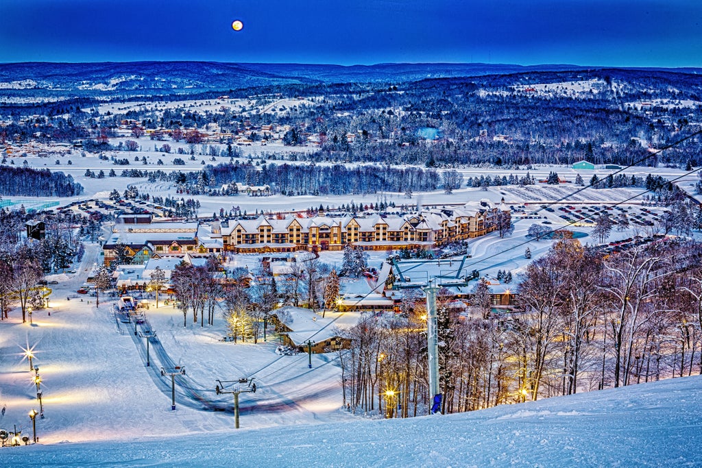 resort-mountain-grand-lodge-winter-moon-view-blurred-lift-line