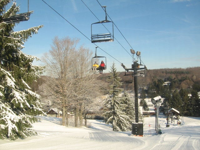 Visitors going up a lift at Snow Trails, OH.