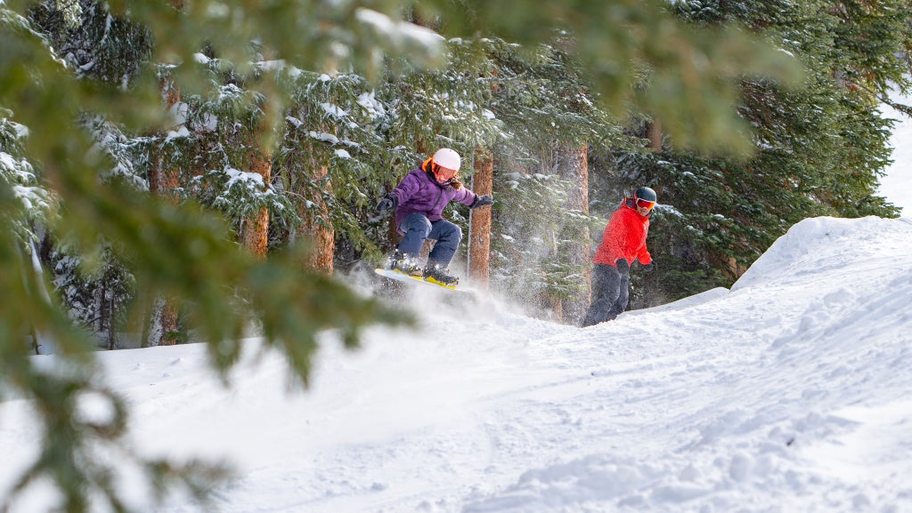 Keystone_Snowboarding girl_Jump_(c): Kathleen Young