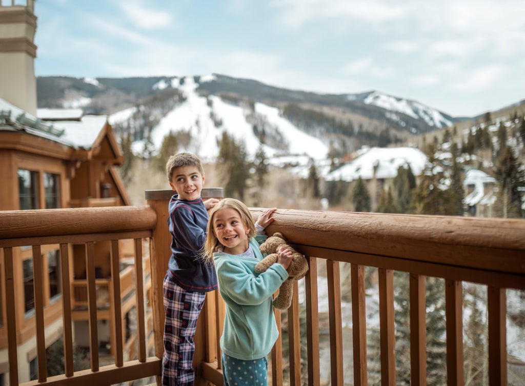 Beaver Creek_Kids on Balcony Morning_(c): Vail Resorts --All rights reserved