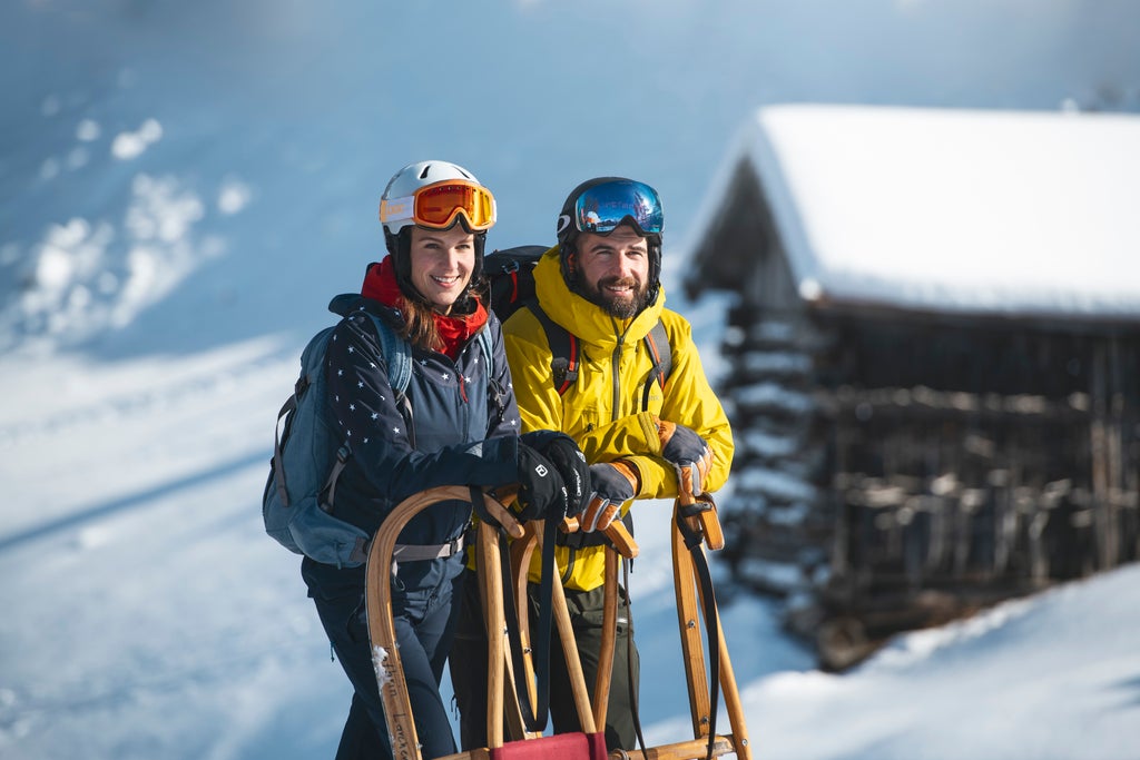 Stubaier Gletscher_Couple Tobogganing_(c): Andre Schönherr