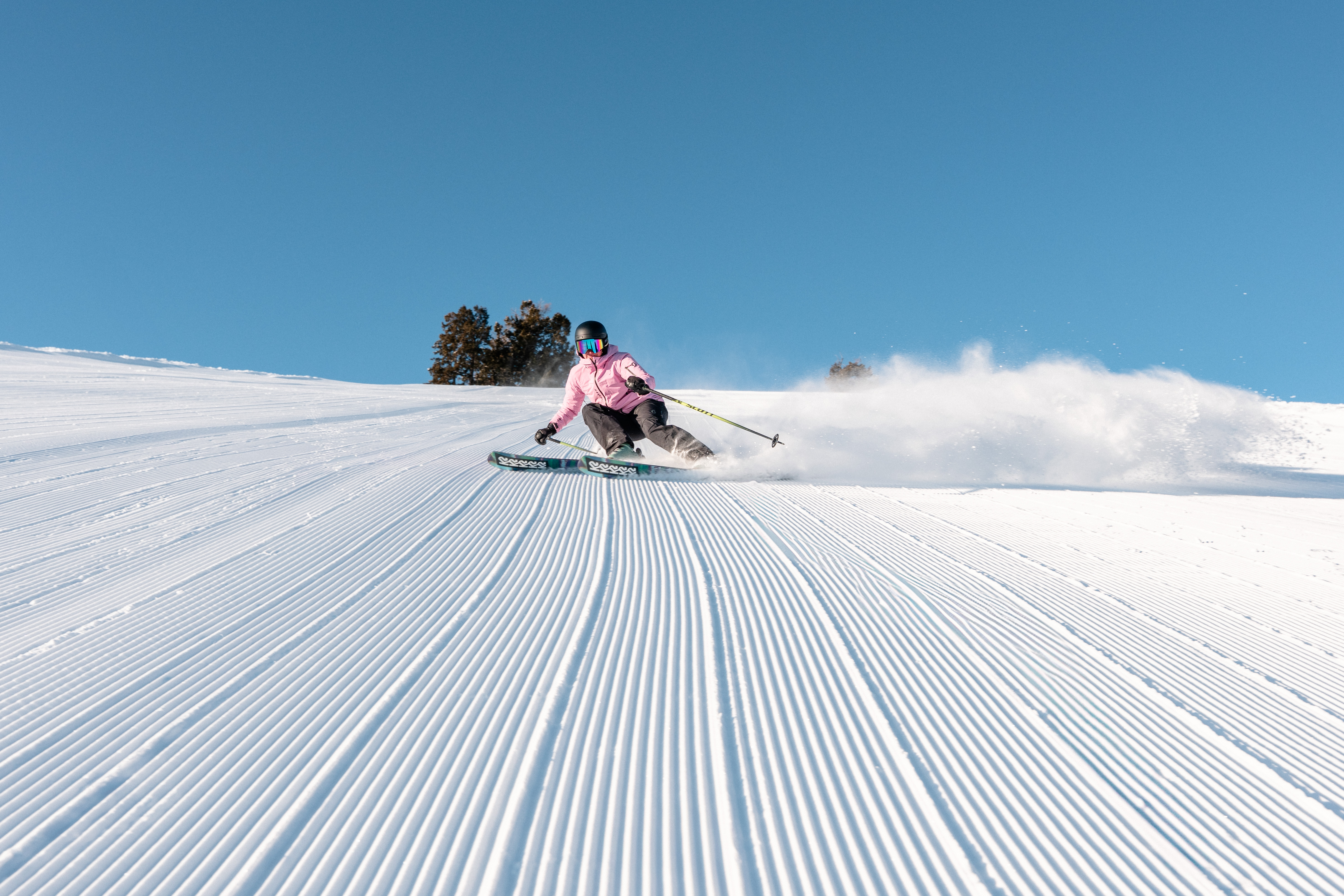 Freshly groomed runs deliver some of the most satisfying skiing and riding you’ll find on the mountain. The snow is firm and fast, the edges hold clean, and ski areas really open up on those long, wide-open cruisers. But not all ski resorts are created equal. Some North America ski resorts have built their reputations
