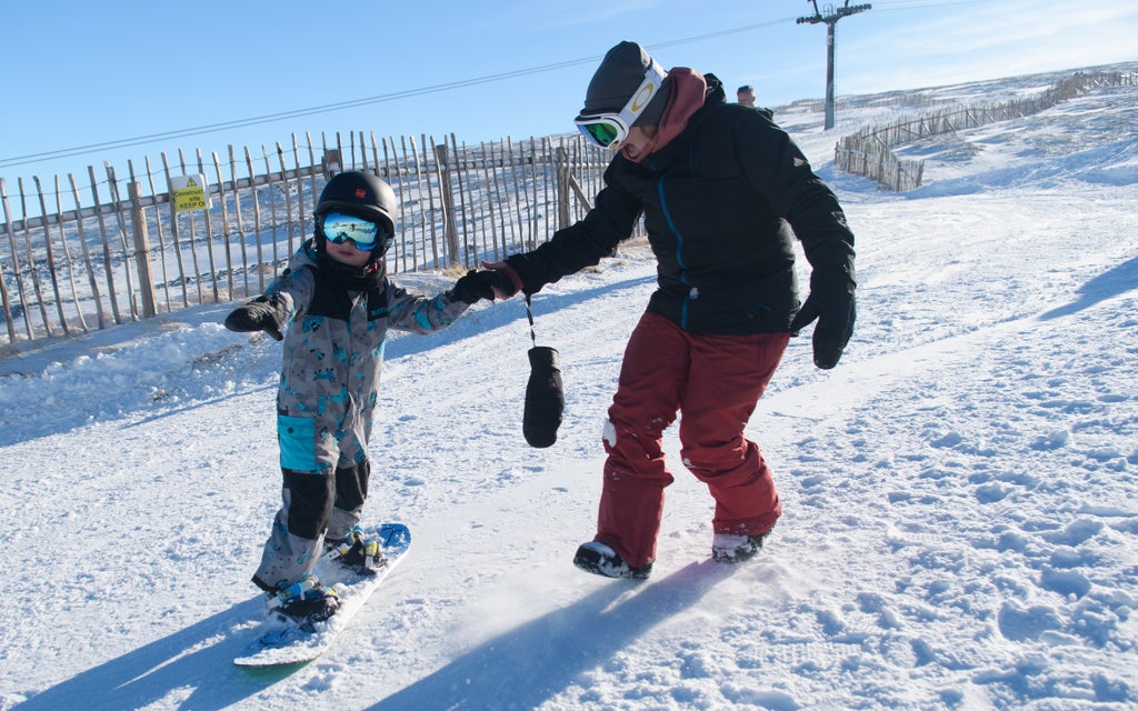 Glencoe_Child Learning to Snowboard_(c): Glencoe